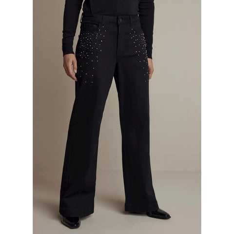 mid-rise waist, falling on the hips for a relaxed look. The jeans are made from light, non-stretch denim fabric in a black,