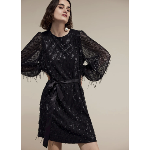 Short dress with patch fringing and small sequins. The A-line dress has long sleeves with smocked cuffs and a round neck with a slit at the back. The dress also features a silky-touch belt at the waist.