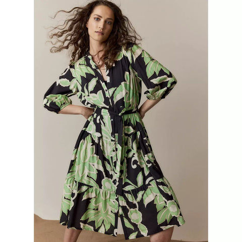 This striped skirt dress has a midi length. The striped skirt, pleated shoulder line and three-quarter puff sleeves give the dress a flowy, playful feel. The button-down front and fresh botanical print give the dress a cool twist. The A-line fit accentuates your waist and the fabric belt enhances this effect.
