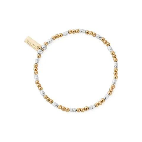 This perfectly dainty piece is an everyday essential for the minimalists, desiring a clean and classic style. This petite string of sparkle beads catches the light effortlessly, bringing you just enough sparkle for every day. 