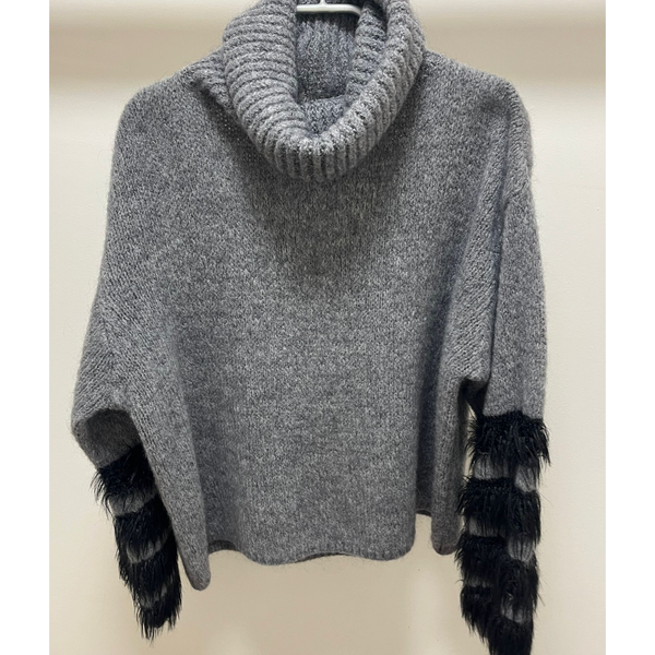 grey roll neck with balck four fluff design on sleeve