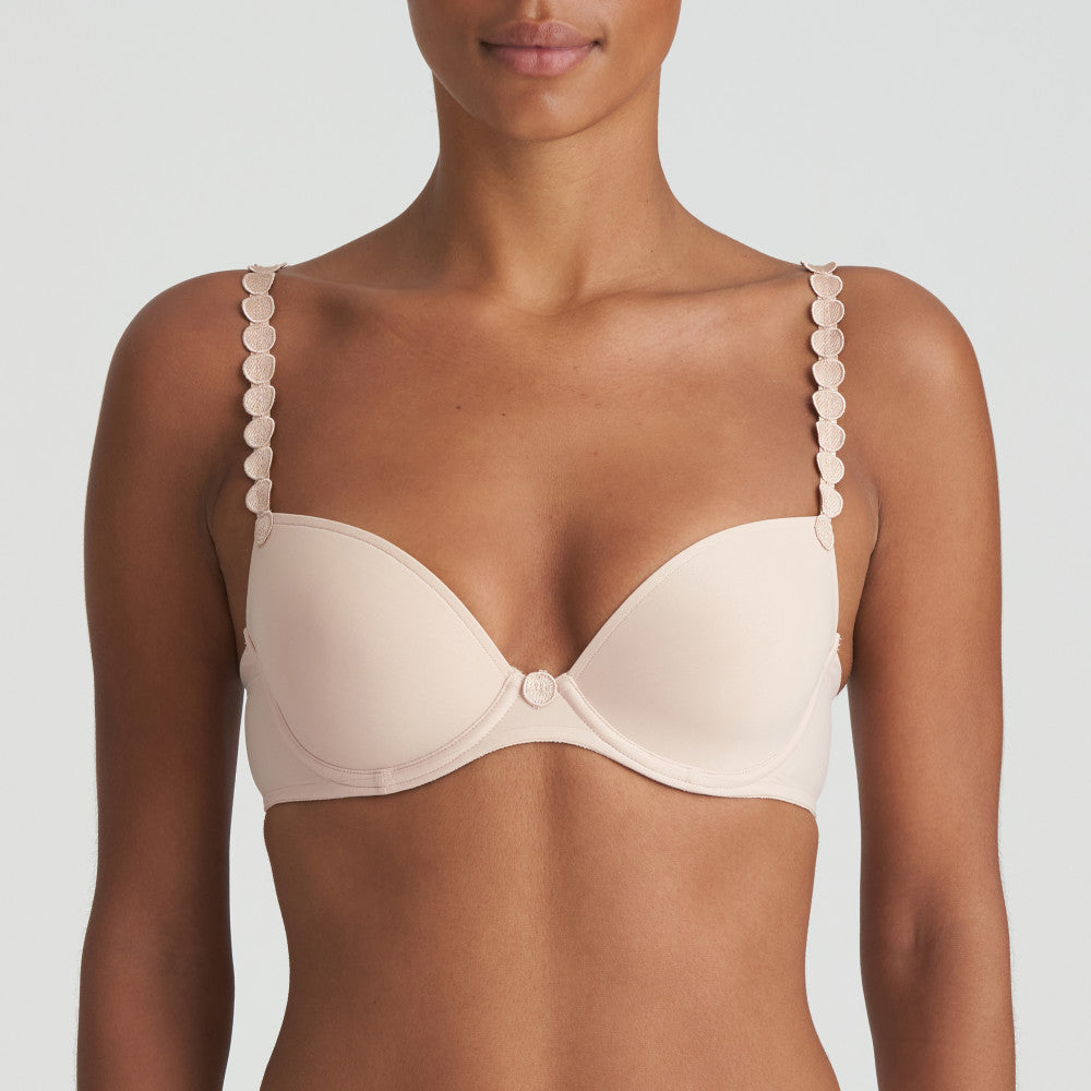 plunge nude bra with decorative circles on straps 