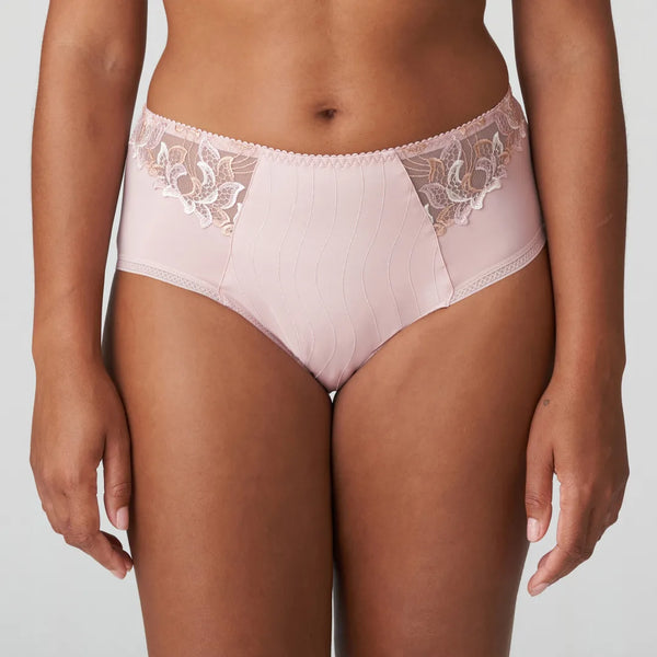 Luxurious, high-waisted opaque briefs finished with decorative embroidery at the legs. ina pale pink which shows up nude against most skin tones 