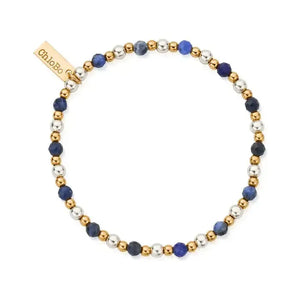 Featuring contrasting beads and subtle pops of colour, incorporate this perfectly dainty piece into your signature ChloBo stack. With beads of 925 sterling silver, 18ct gold plating and semi-precious sodalite, wear this bracelet to add depth to your stack.