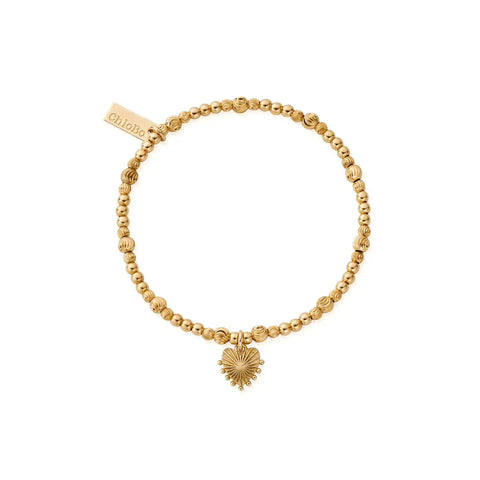 GOLD BRACELET WITH DAINTY GOLD BEADS AND BEAMING HEART CHARM