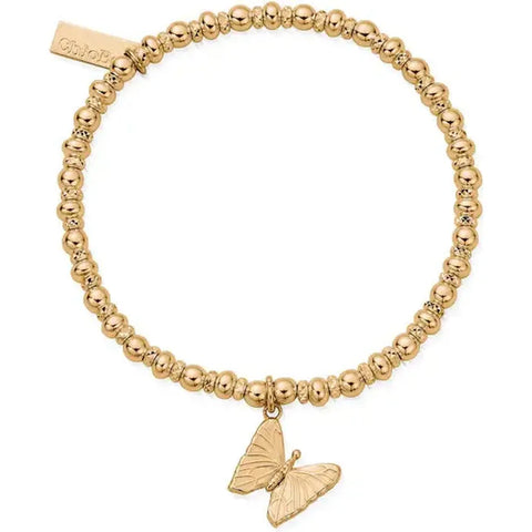 dainty gold bracelet with butterfly charm 