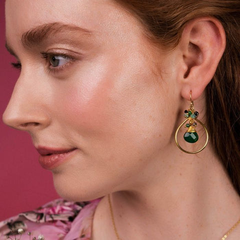 These gorgeous teardrop frame earrings are adorned with a faceted gemstone each, embellished with tiny gemstone and crystal beads to create a delicate movement and a colourful statement. The natural stone colours harmonize with the soft gold frame, making this pair truly unique and elegant.