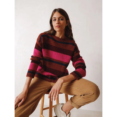 burgundy jumper with dark red, pink and navy stripes in differnt thicknesses