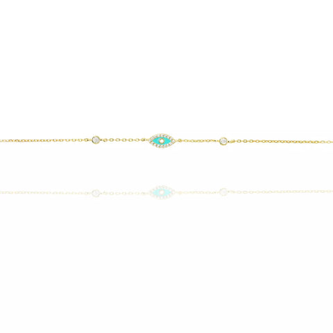 gold bracelet with turquoise charm evil eye set with cz