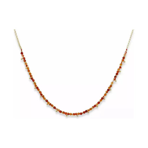 Betty's Salus  Carnelian Gold Necklace features Carnelian gem stones thought to be a stone of courage, endurance, energy, leadership, and motivation making the wearer in a good mood throughout the day.  This feel good necklace is made from 14K Gold Plate on brass and its length is up to 26cm with an easy to fasten lobster claw.