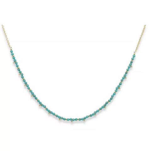 This stylish necklace is loaded with turquoise-coloured gemstones on a gold chain. Turquoise is known for its calming properties and is believed to bring peace and relaxation. Style it with other necklaces from the collection to make your layering look statement.  Made with 14k gold plate on brass and turquoise-coloured gemstones. Length is up to 17" inches, with an easy-to-fasten lobster claw.