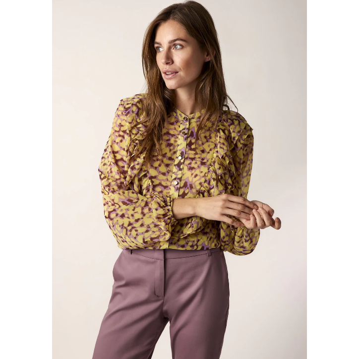 yellow and purple blouse with popper buttons down the centre and slight balloon sleeves 