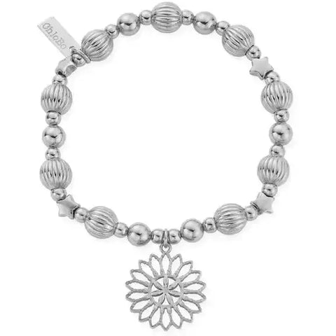 chunky silver bracelet with corregate beads and large flower charm 