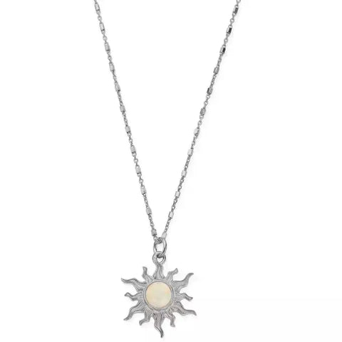 silver chain with sun charm with opal set in the centre