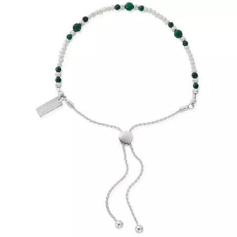dainty freshwater pearls and ethereal beads of malachite